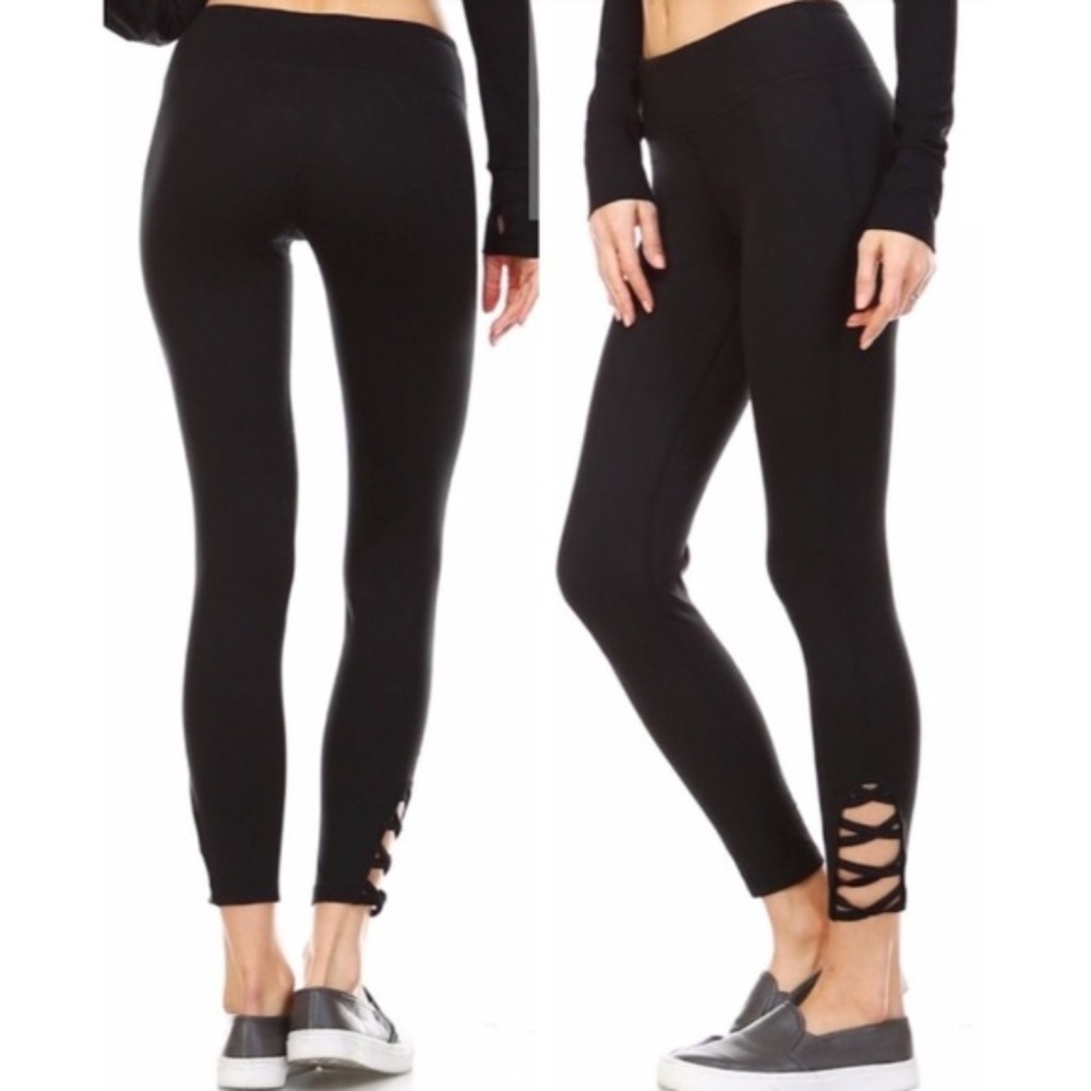 Leggings with criss cross bottom